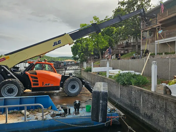 Telehandler staged on the barge for a pool move