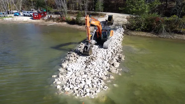 Building the rock toe out into the lake