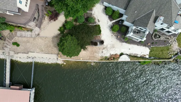 Finished seawall and restored landscaping